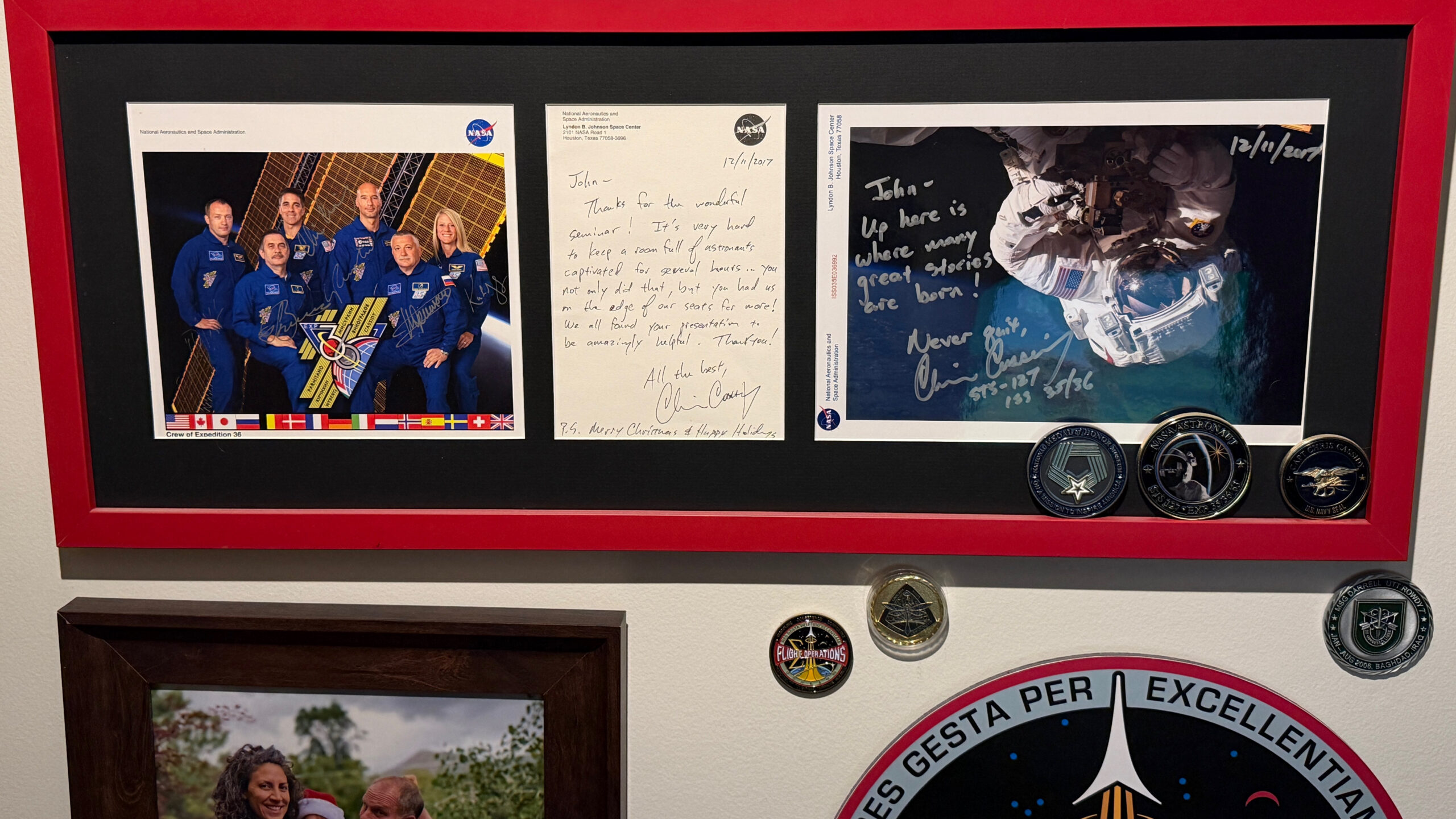 Framed NASA astronaut photographs and handwritten recommendation to John Bates from retired astronaut and U.S. Navy SEAL Chris Cassidy.